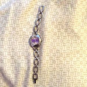 Silver chain bracelet watch with purple clock